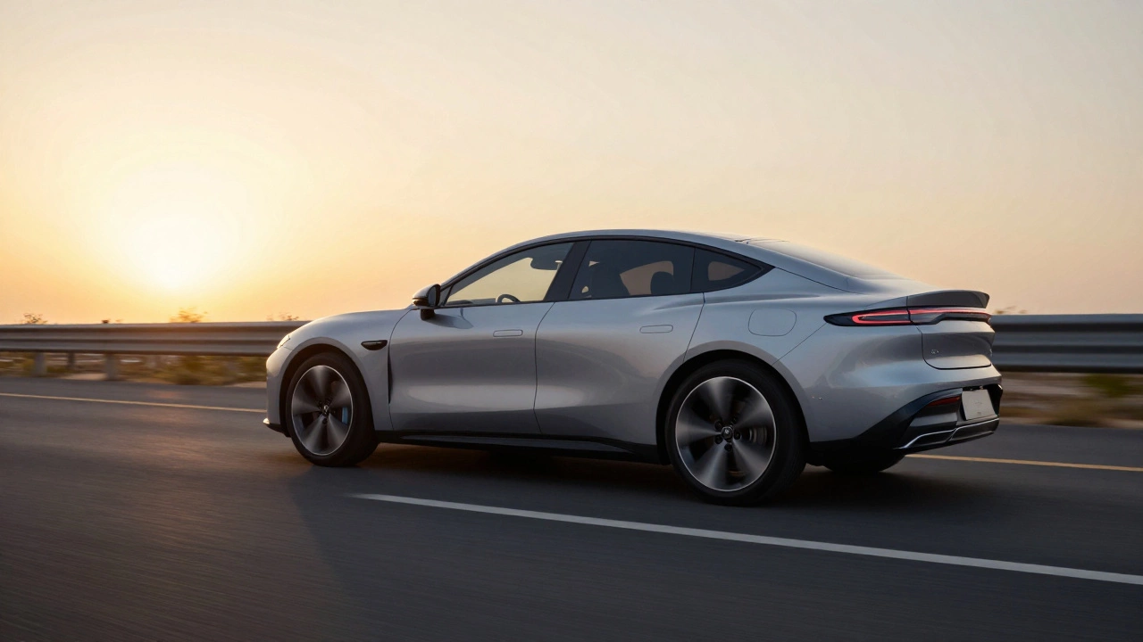 Low-angle shot of aerodynamic alloy wheels on a hybrid car driving on a highway.
